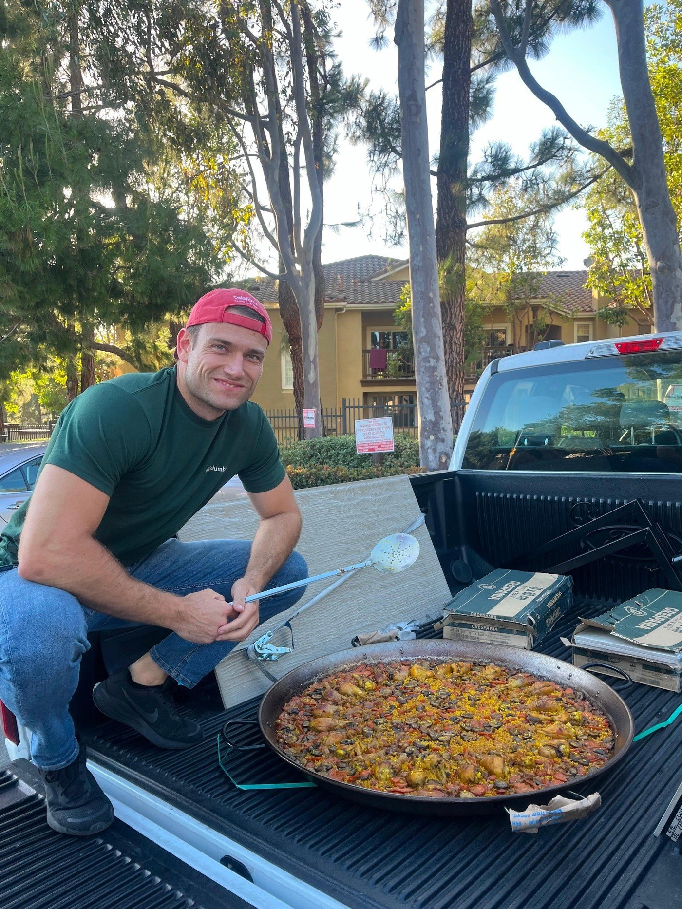 Pau transporting a paella and equipment in his pickup